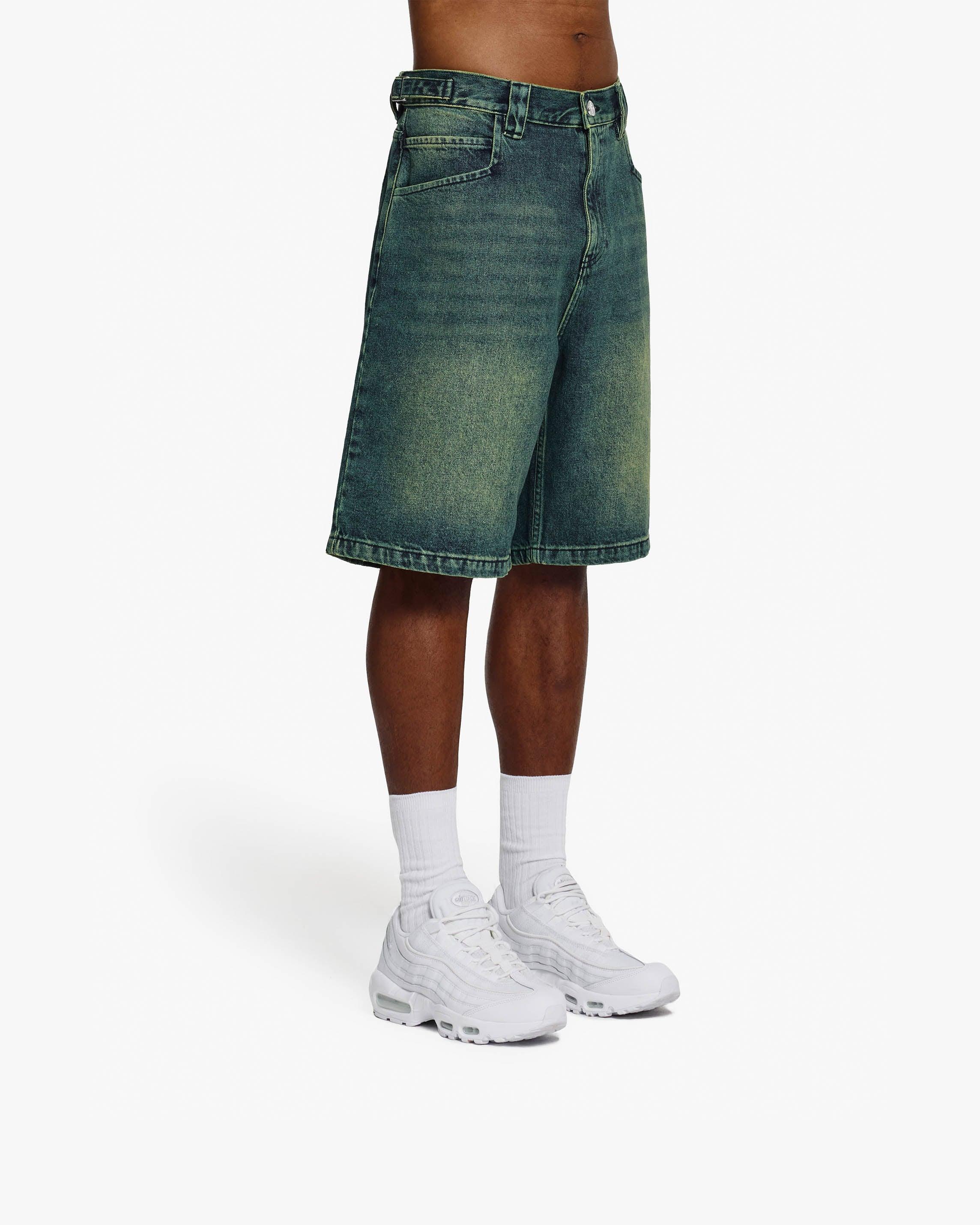 GREEN TINTED DENIM JORTS