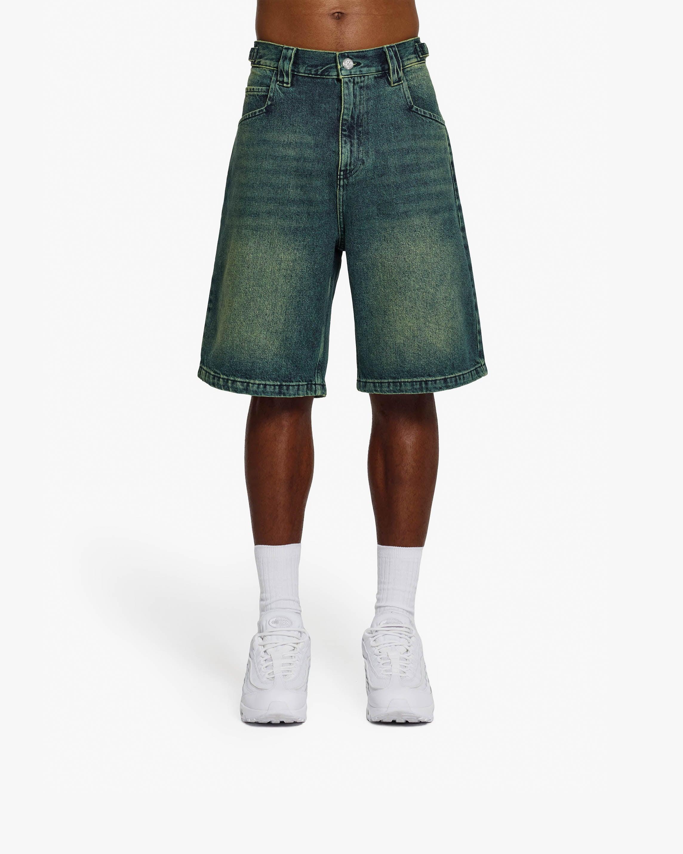GREEN TINTED DENIM JORTS