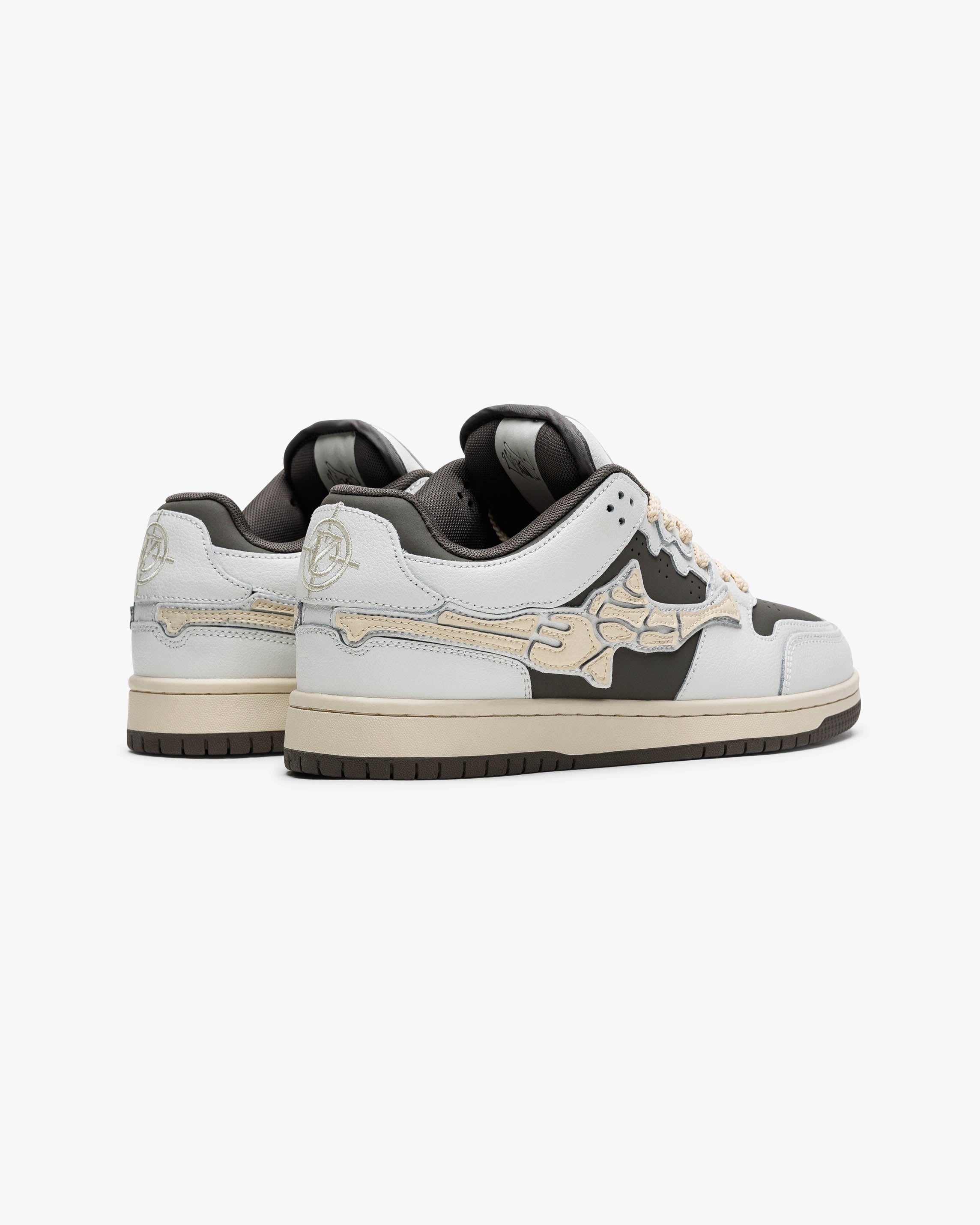 AKIMBO LOWS "BONE CAPER"